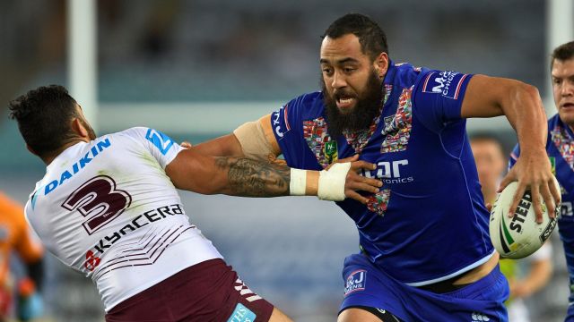 Wrecking ball: Sam Kasiano charges into Dylan Walker last season.