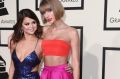 Musicians Selena Gomez (left) and Taylor Swift at this year's Grammy Awards.