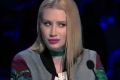 Not feeling it: Iggy Azalea looks askance at a singer.