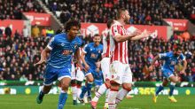 STOKE ON TRENT, ENGLAND - NOVEMBER 19: Nathan Ake of AFC Bournemouth (L) celebrates scoring his sides first goal during ...