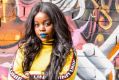 Tkay Maidza in front of the graffiti wall at Brisbane’s Chur Burger.