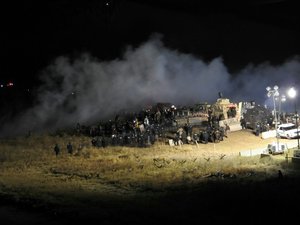 In this image provided by Morton County Sheriff’s Department, law enforcement and protesters clash near the site of the Dakota Access pipeline on Sunday, Nov. 20, 2016, in Cannon Ball, N.D.