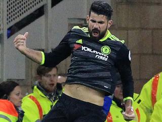 Chelsea's Brazilian-born Spanish striker Diego Costa (C) celebrates scoring his team's first goal during the English Premier League football match between Middlesbrough and Cheslea at Riverside Stadium in Middlesbrough, northeast England on November 20, 2016. Chelsea won the match 1-0. / AFP PHOTO / Lindsey PARNABY / RESTRICTED TO EDITORIAL USE. No use with unauthorized audio, video, data, fixture lists, club/league logos or 'live' services. Online in-match use limited to 75 images, no video emulation. No use in betting, games or single club/league/player publications. /