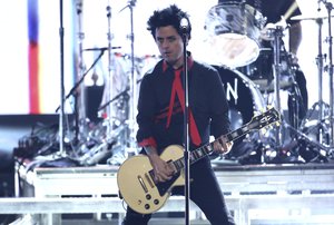 Billie Joe Armstrong, of Green Day, performs "Bang Bang" at the American Music Awards at the Microsoft Theater on Sunday, Nov. 20, 2016, in Los Angeles.