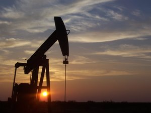 This pump jack located south of Midland, Texas is a common sight in West Texas An oil well is a general term for any boring through the earth's surface that is designed to find and produce petroleum oil hydrocarbons. Usually some natural gas is produced along with the oil.