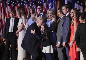 President elect Donald Trump greets members of his family after giving an his acceptance speech at an election night rally, Wednesday, Nov. 9, 2016, in New York.