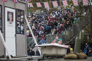 A float featuring a man in a bath parades past St Paul's Cathedral during the Lord Mayor's Show on November 12, 2016 in ...