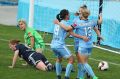 Strike force: Remy Siemsen is congratulated by Leena Khamis and Georgia Yeoman-Dale after scoring Sydney's second goal.