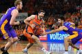 Direct route: Jarrad Weeks of the Taipans drives to the basket against the Kings at Cairns Convention Centre.