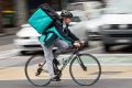 Foodora and Deliveroo employ backpackers and students to deliver food on bicycles.