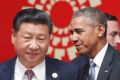 Changing of the guard: Xi Jinping and Barack Obama pass each other at the APEC summit's opening session in Lima.