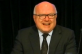 Attorney-General George Brandis captured by the Sky News camera and microphone.