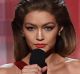 Gigi Hadid impersonates Melania Trump alongside co-host Jay Pharoah during the 2016 American Music Awards on Sunday in ...