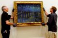 Upon seeing Vincent van Gogh's <i>Starry Night </i>properly lit at the NGA, the director of the Musee D'Orsay was ...