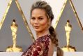 Chrissy Teigen attends the 88th Annual Academy Awards earlier this year.