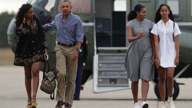 US President Barack Obama with first lady Michelle Obama and their daughters Malia, right, and Sasha.