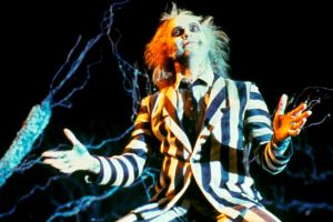 Michael Keaton as the ghost Betelgeuse in Tim Burton's 1988 horror comedy <i>Beetlejuice</I>.