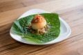 The delicate Miang scallop with peanut and toasted coconut served at Eleven Tigers, Brunswick East.