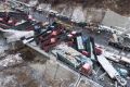 The mass pile-up on a Chinese highway left 17 people dead. 