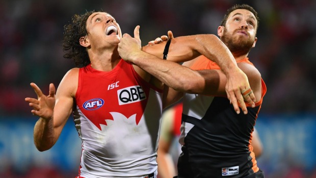 Cross-town tussle: Kurt Tippett and Shane Mumford jostle for possession.