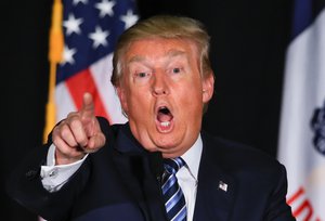 Republican presidential candidate Donald Trump speaks during a campaign stop in Council Bluffs, Iowa, Tuesday, Dec. 29, 2015.