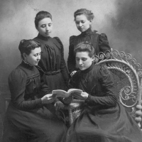 Four Elkhart Institute Ladies with Book, undated