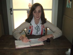 Anne Frank's wax model located in the Madame Tussauds Amsterdam wax museum.