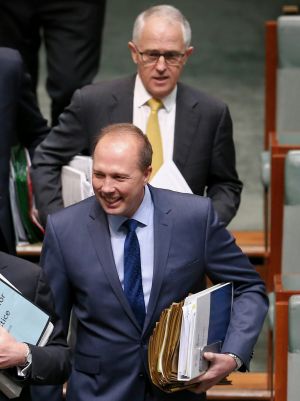 Prime Minister Malcolm Turnbull and Immigration Minister Peter Dutton arrive for question time on Tuesday.