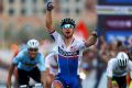 Peter Sagan of Slovakia celebrates victory as he crosses the finish line in the Elite Men's Road Race on day eight of ...