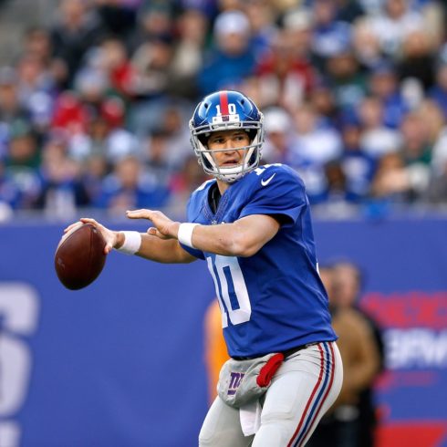 New York Giants quarterback Eli Manning (10) throws a pass during an NFL football game against the New York Jets on Sunday, Dec. 6, 2015 in East Rutherford, N.J. The New York Jets won 23-20 in overtime. (Aaron M. Sprecher via AP)