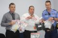 Detective Constable Mike Williams, Detective Senior Sergeant Mitch Howard and Constable Jeremy Lloyd with the drugs seized. 