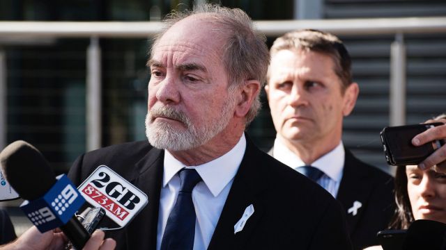 Uniting enemies: Australian Rugby League Commission chairman John Grant held a circle-the-wagons press conference on Friday.