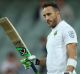 South African captain Faf du Plessis celebrates after scoring a century during day one of the Third Test match at ...