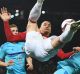 Man U's Zlatan Ibrahimovic climbs over Tonny Vilhena of Feyenoord during their Europa League romp over Feyenoord at Old ...