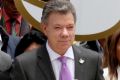 Colombia's President Juan Manuel Santos delivers the original peace deal to Congress.