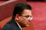 Senator Nick Xenophon and Minister for Employment and Minister for Women Michaelia Cash during debate in the Senate on ...