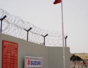 Union flag at factory gate, showing their role.