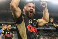 Panthers winger Josh Mansour celebrates beating Canterbury at Allianz Stadium on Sunday.