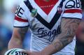 NEWCASTLE, AUSTRALIA - AUGUST 09: Jared Waerea-Hargreaves of the Roosters runs the ball during the round 22 NRL match ...