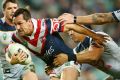 Determined: Mitchell Pearce finds space at Allianz Stadium.