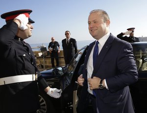 File - Maltese Prime Minister Joseph Muscat arrives on the occasion of a summit on migration in Valletta, Malta, Thursday, Nov. 12, 2015.