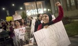   Demonstrators protest the election of Donald Trump in Oakland, California. Photo by Emily Harger.  