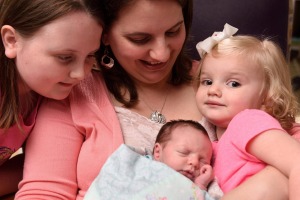 Margaret Boemer and her older daughters with baby Lynlee.