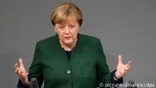 Deutschland Generaldebatte im Bundestag zum Haushalts-Etat 2017 Merkel (picture-alliance/dpa)