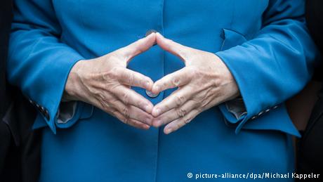 Angela Merkel's hands Copyright: Michael Kappeler/dpa