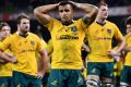 Dejected: Will Genia takes in the Wallabies' missed opportunity.