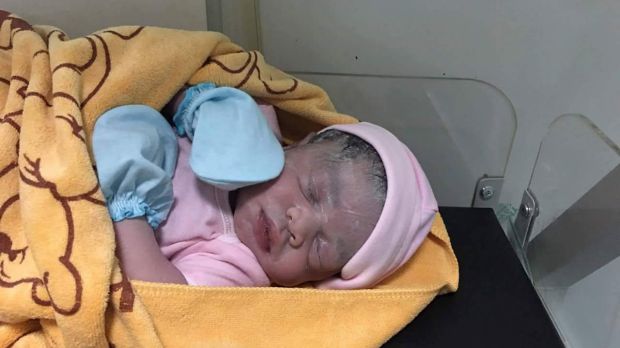 Cambodian Lux Clinic posted a photo of a minutes-old baby girl on Facebook following Hour Vanny's cesarean section on ...