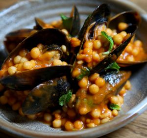 Shane Delia's mussels with saffron and moghrabieh couscous.