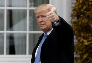 President-elect Donald Trump gives the thumbs up as he arrives at the Trump National Golf Club Bedminster clubhouse, Sunday, Nov. 20, 2016 in Bedminster, N.J..