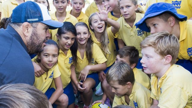 Wallabies coach Michael Cheika with students at a Game On workshop at Bronte Public School. 